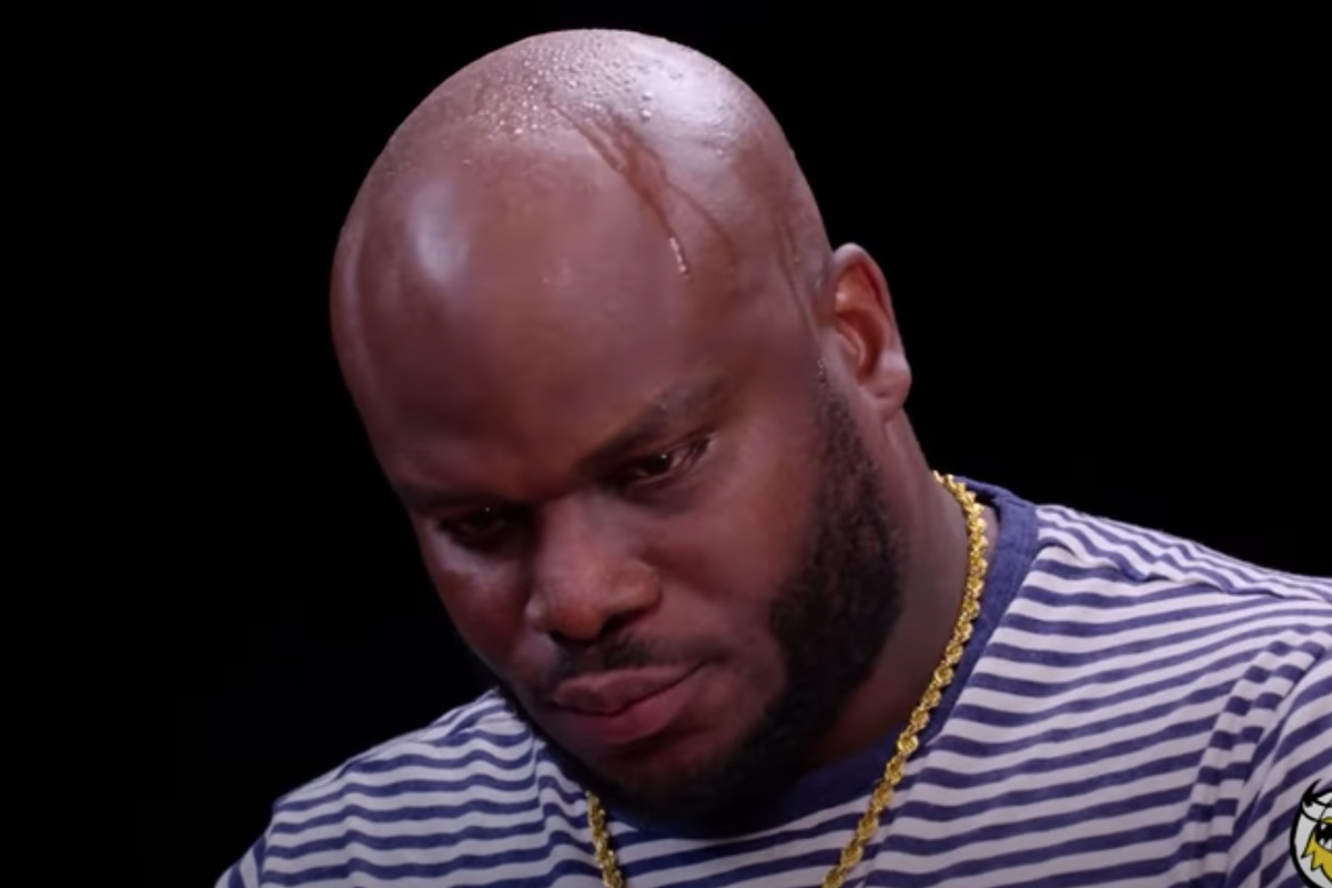 Derrick Lewis takes on the “Hot Ones” challenge. 