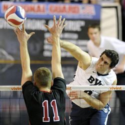 BYU's Josue Rivera (6) gets a shot past the defense of Stanford's Daniel Tublin (11) during a match against the Stanford Cardinal Friday, Jan. 24, 2014, at the Smith Fieldhouse in Provo.