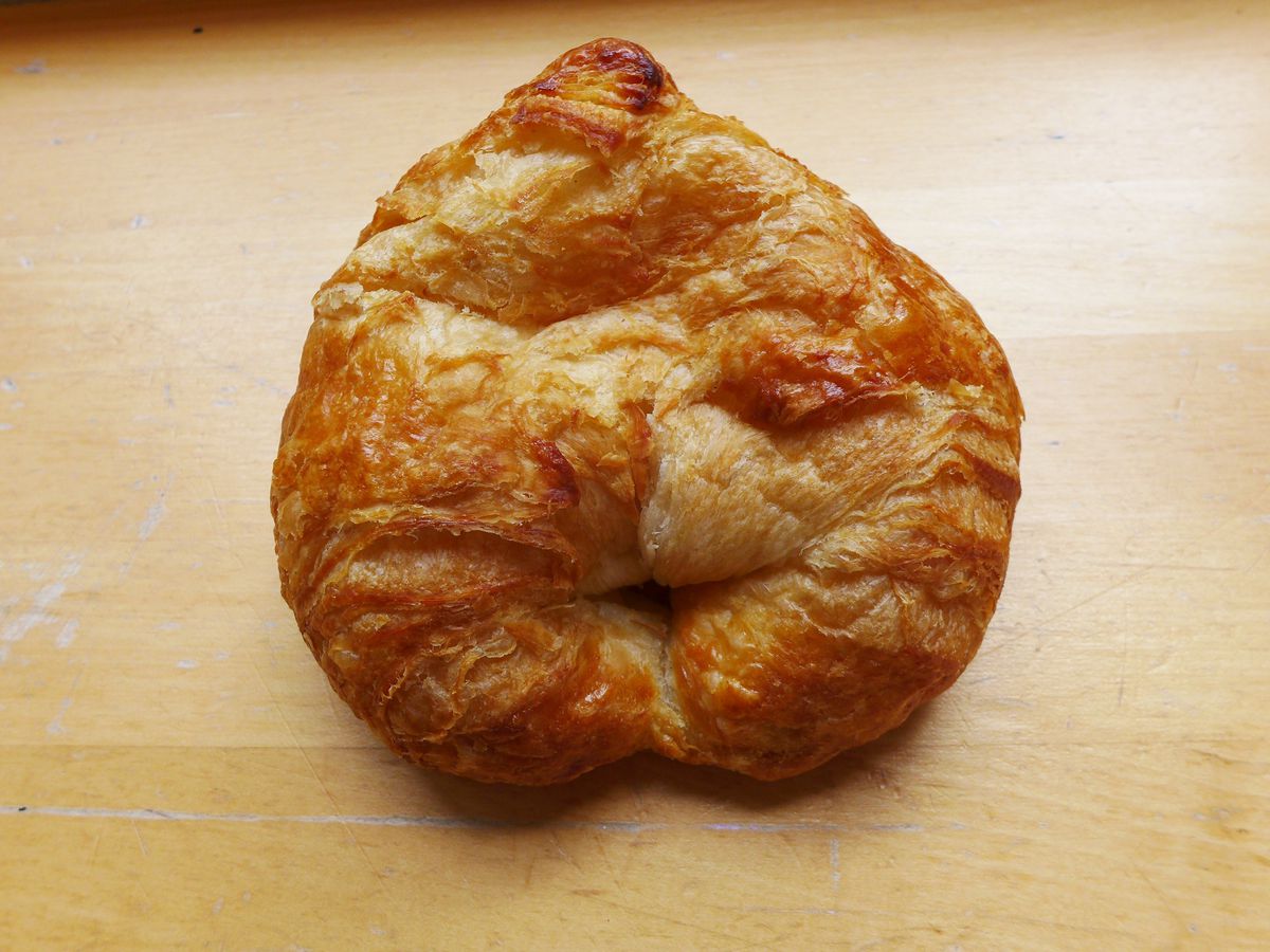 An almost round croissant.