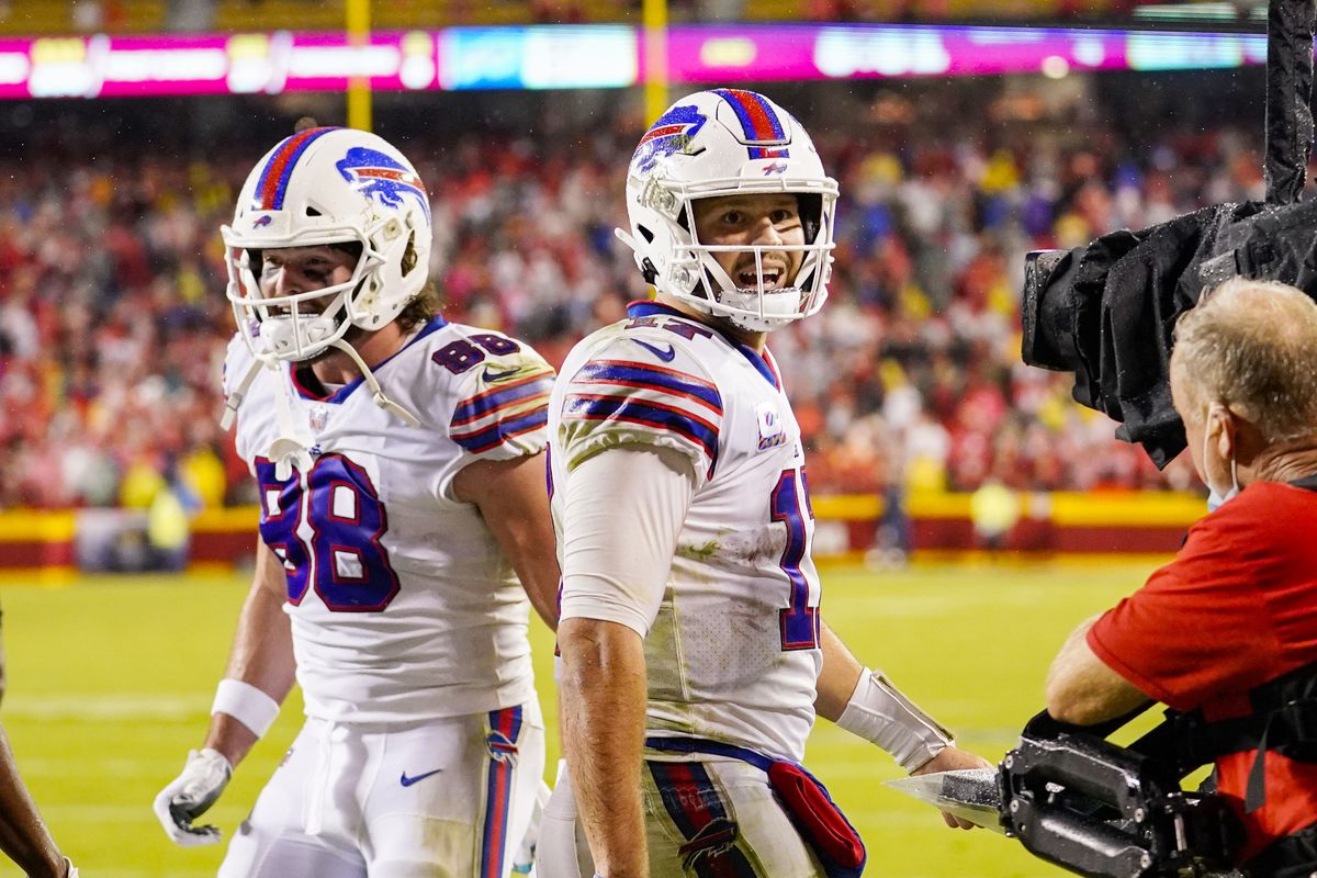 Buffalo Bills quarterback Josh Allen (17) and tight end Dawson Knox (88) celebrate after a touchdown against the Kansas City Chiefs during the second half at GEHA Field at Arrowhead Stadium.