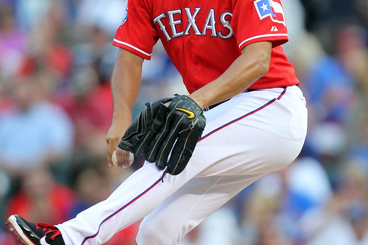 ARLINGTON, TX - JUNE 26: Yu Darvish #11 of the Texas Rangers pitches against the Detroit Tigers on June 26, 2012 at the Rangers Ballpark in Arlington, Texas. (Photo by Layne Murdoch/Getty Images)