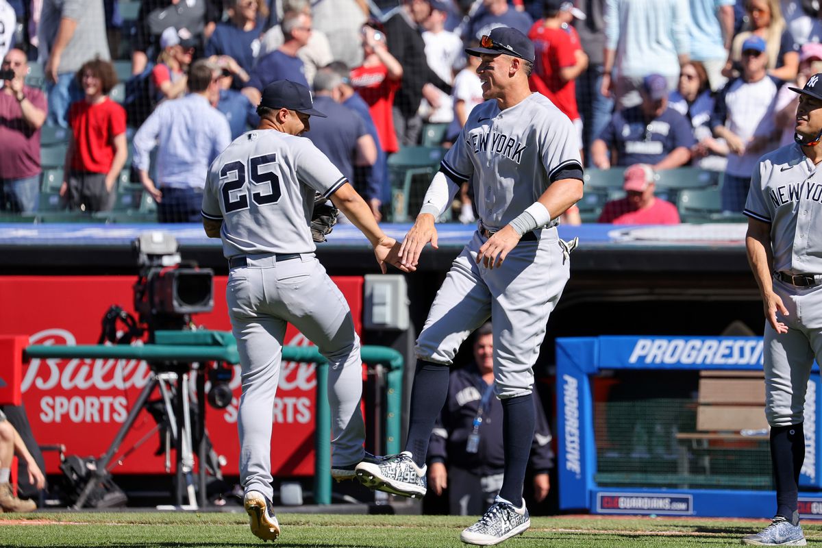 New York Yankees second baseman Gleyber Torres and New York Yankees designated hitter Aaron Judge celebrate following the Major League Baseball game between the New York Yankees and Cleveland Guardians on April 12, 2023, at Progressive Field in Cleveland, OH.