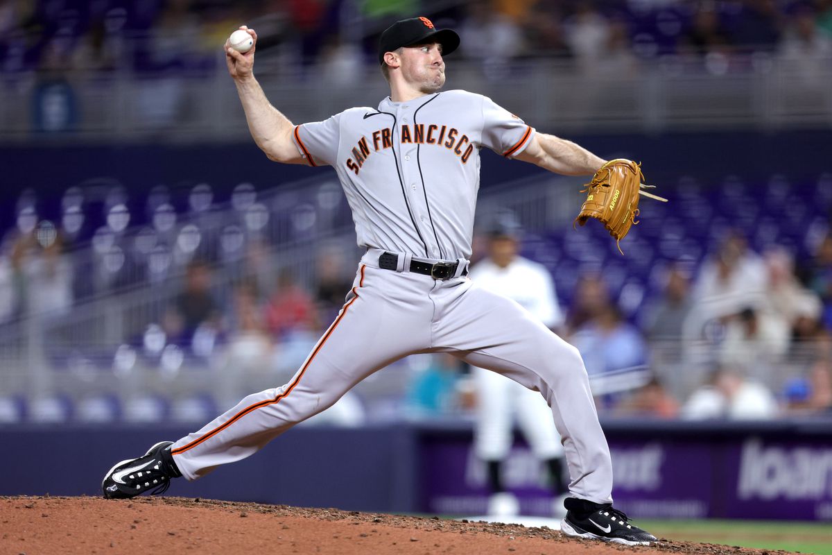 Ross Stripling #48 of the San Francisco Giants delivers a pitch against the Miami Marlins during the seventh inning at loanDepot park on April 18, 2023 in Miami, Florida.