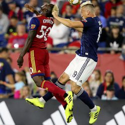 Real Salt Lake forward Sam Johnson (50) and New England Revolution defender Antonio Mlinar Delamea (19) battle for a head ball during the first half of an MLS soccer match at Gillette Stadium, Saturday, Sept. 21, 2019, in Foxborough, Mass. 