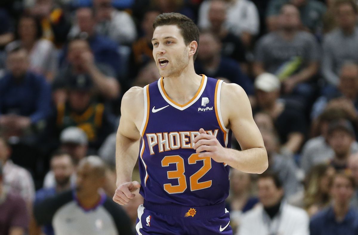 Phoenix Suns guard Jimmer Fredette (32) runs up court during the first half of an NBA basketball game against the Utah Jazz Monday, March 25, 2019, in Salt Lake City.
