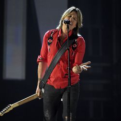 Keith Urban performs "Coming Home" at the 53rd annual Academy of Country Music Awards at the MGM Grand Garden Arena on Sunday, April 15, 2018, in Las Vegas. For the first time, Urban will headline the 2019 Bank of American Fork Stadium of Fire on July 4 in Provo.