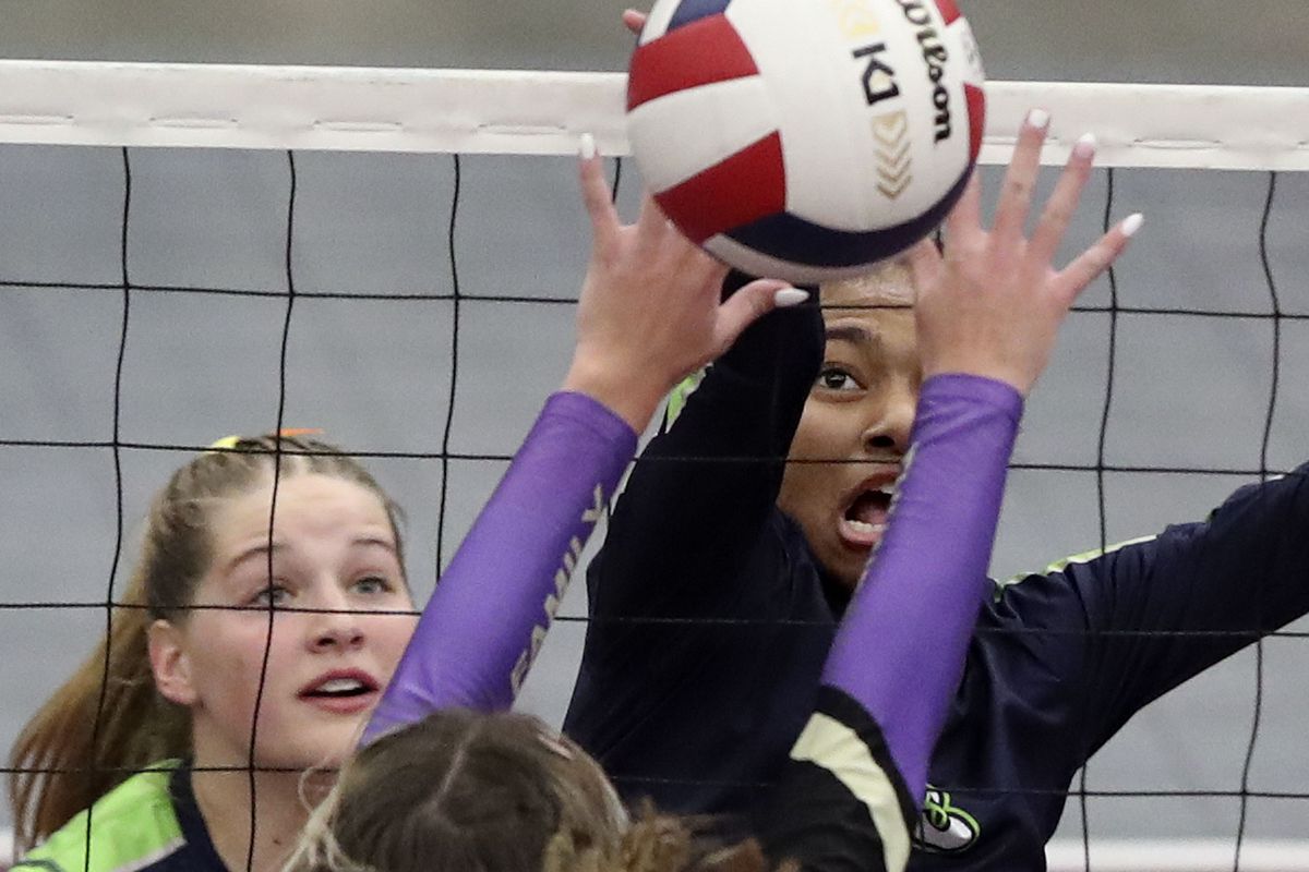 Ridgeline’s Nia Damuni gets the ball over the net in the game against Desert Hills in the 4A volleyball state championship game at Utah Valley University in Orem on Thursday, Oct. 28, 2021.