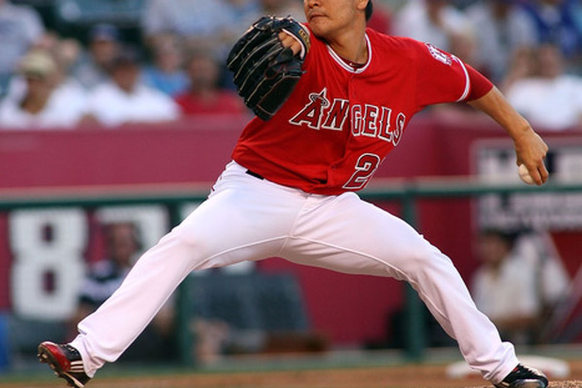 ANAHEIM, CA - JUNE 23:  Hisanori Takahashi #21 of the Los Angeles Angels of Anaheim pitches against the Los Angeles Dodgers in the ninth inning at Angel Stadium of Anaheim on June 23, 2012 in Anaheim, California.  (Photo by Jeff Golden/Getty Images)