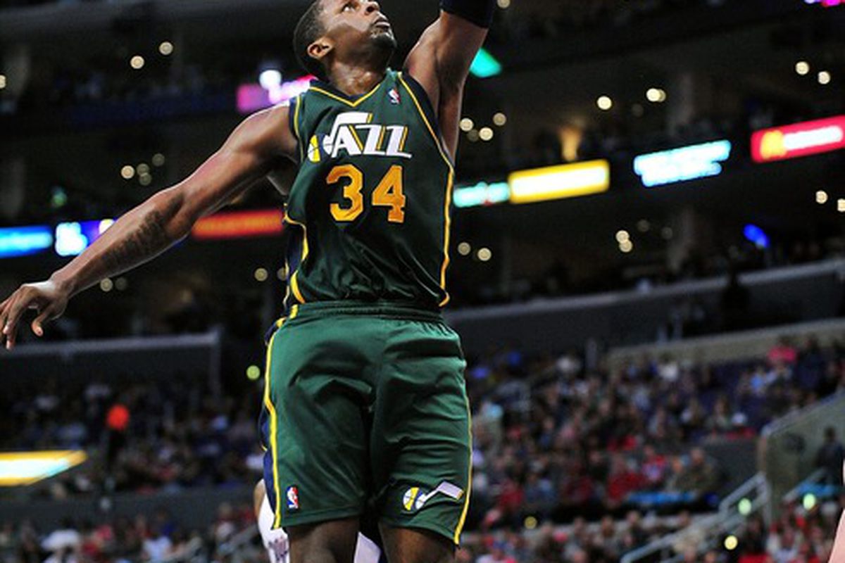 March 31, 2012; Los Angeles, CA, USA; Utah Jazz small forward C.J. Miles (34) dunks to score a basket against the Los Angeles Clippers during the second half at Staples Center. Mandatory Credit: Gary A. Vasquez-US PRESSWIRE