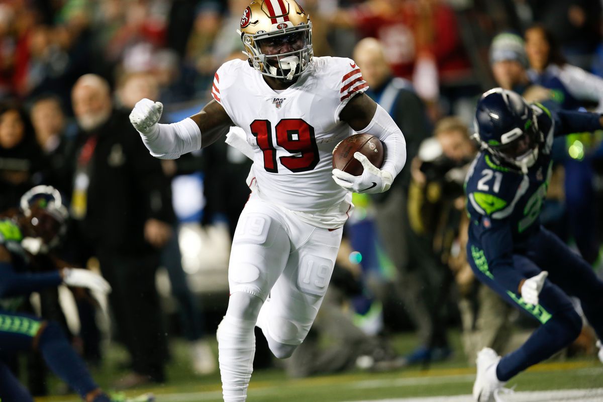 &nbsp;Deebo Samuel #19 of the San Francisco 49ers rushes for a 30-yard touchdown during the game against the Seattle Seahawks at CenturyLink Field on December 29, 2019 in Seattle, Washington. The 49ers defeated the Seahawks 26-21.