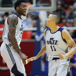 Utah Jazz forward Eric Griffin (17) celebrates with Utah Jazz guard Dante Exum (11) after a 3-point shot as the Utah Jazz and the Philadelphia 76ers play in Summer League action in the Huntsman Center at the University of Utah in Salt Lake City on Wednesday, July 5, 2017.