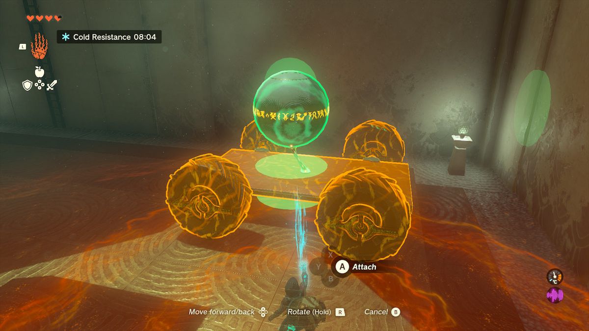 Link uses Ultrahand to attach an orb to a cart in the Tukarok Shrine in Zelda Tears of the Kingdom.