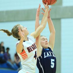 Brighton's Sammie Smith goes for a steal on Layton's Megan Benson Wednesday, Feb. 18, 2015, in 5A State quarterfinal action at Salt Lake Community College in Taylorsville.