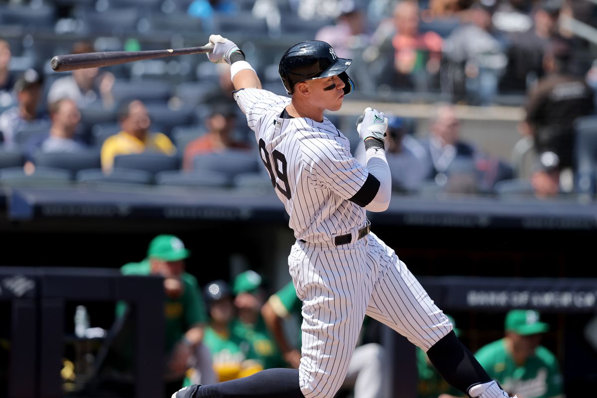 New York Yankees designated hitter Aaron Judge follows through on a double against the Oakland Athletics during the fifth inning at Yankee Stadium.
