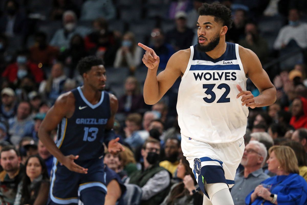 Minnesota Timberwolves center/forward Karl-Anthony Towns (32) reacts after a basket during the second half against the Memphis Grizzles at FedExForum.