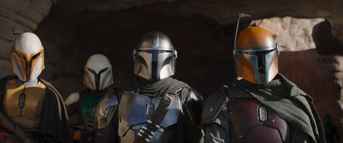 A group of Mandalorians wearing their armor and helmet in Season 3 of The Mandalorian.