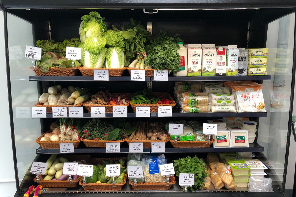 A shelf of produce at a market