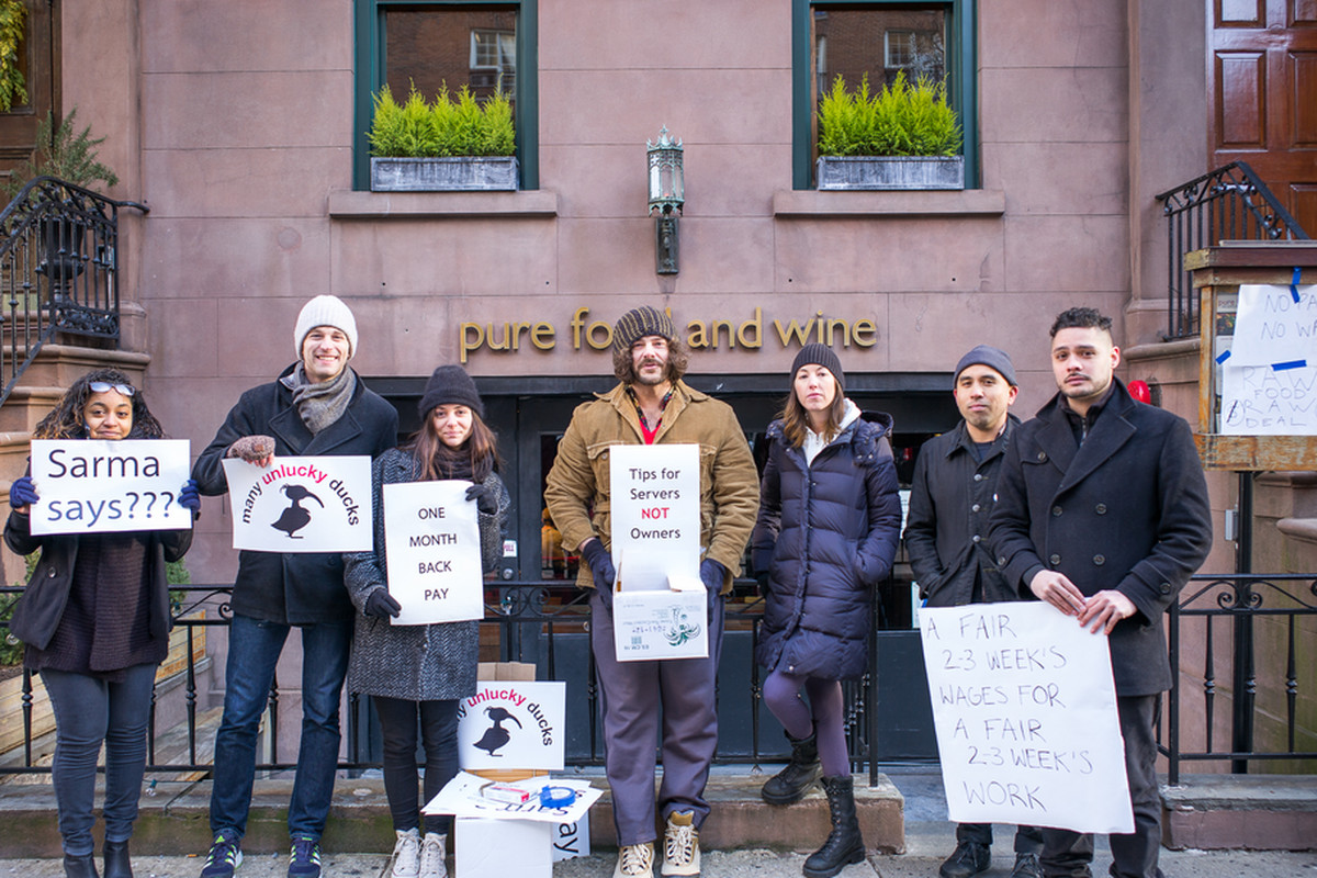 Workers protesting Pure Food & Wine earlier this year. 