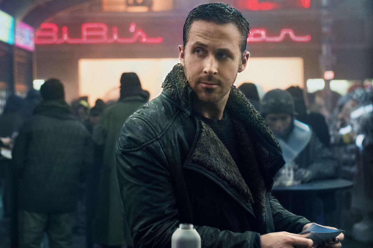 Ryan Gosling from Blade Runner 2049 in a group of people.