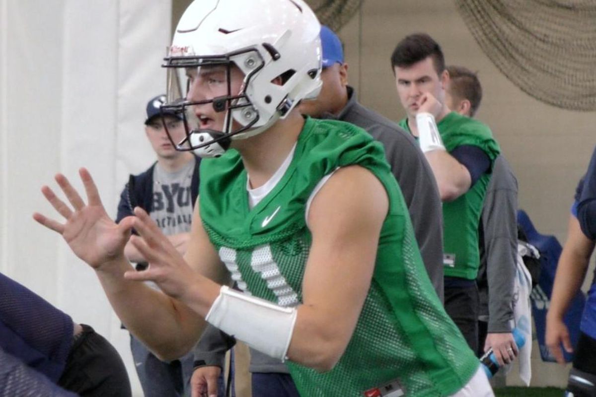 BYU freshman quarterback Zach Wilson readies for the snap during the Cougars' opening day of spring camp on Monday, March 5, 2018, at BYU's Indoor Practice Facility in Provo.