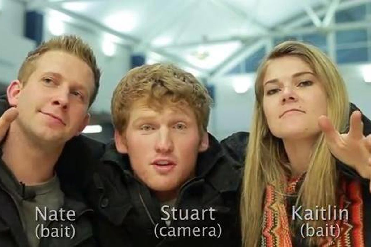 Nathan Turley, Stuart Edgington and Kaitlin Snow participate in the "Mistletoe Kissing Prank" video that has now gone viral on YouTube. The video was filmed at BYU. 