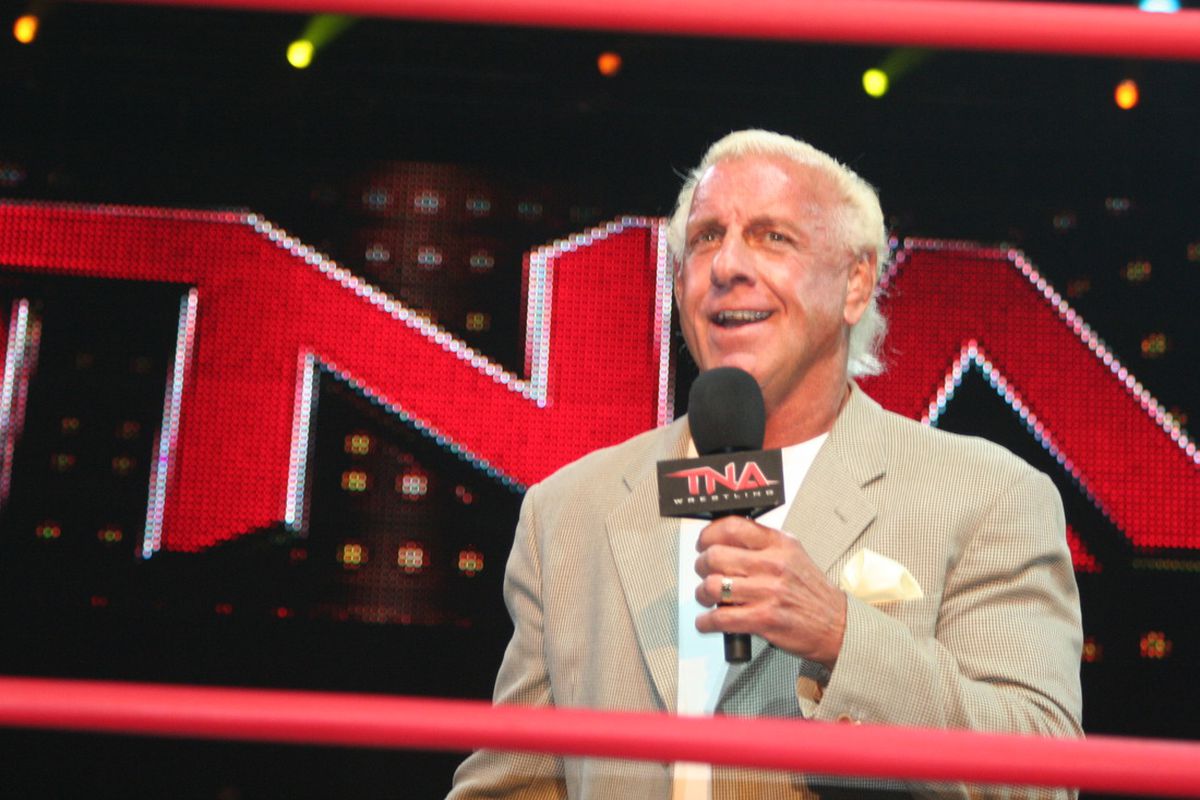 You wouldn't realise it from watching WWE television, but Ric Flair still works for TNA.  Photo via <a href="http://upload.wikimedia.org/wikipedia/commons/b/b3/Flair_TNA.jpg">upload.wikimedia.org</a>.