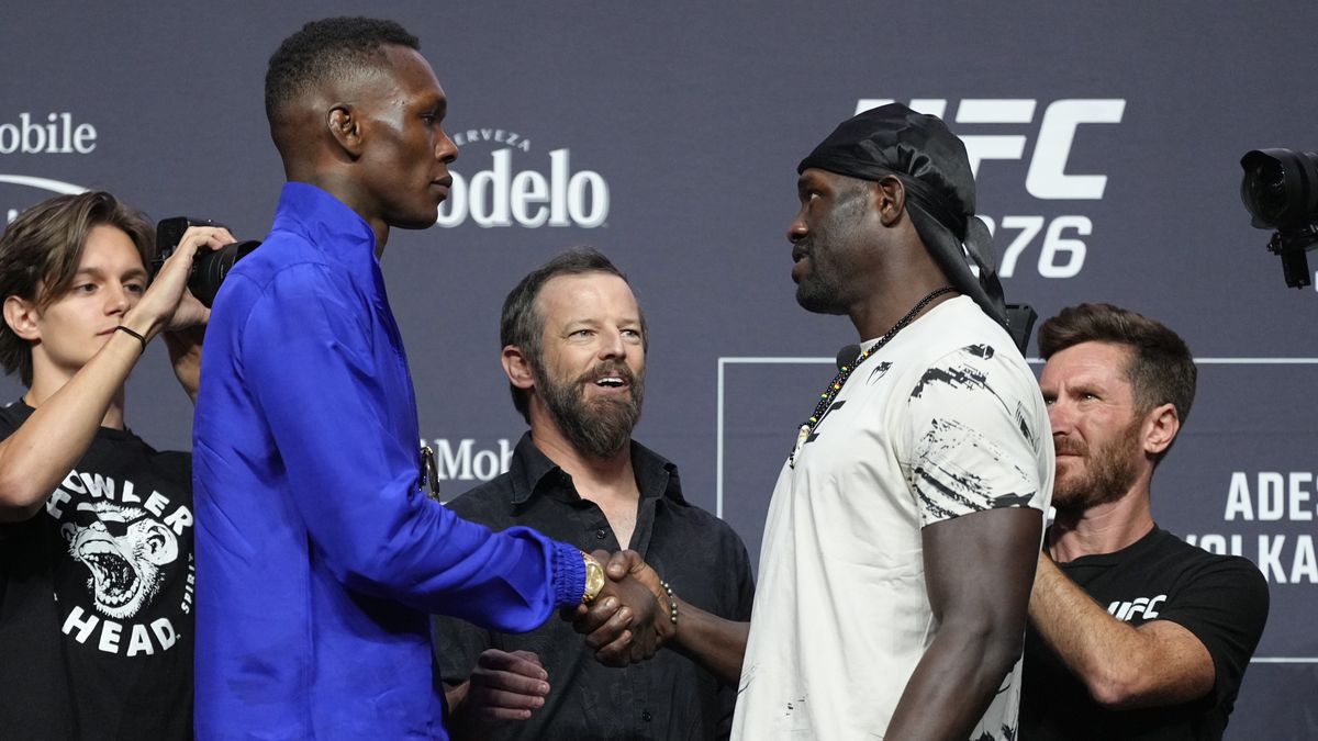 Opponents Israel Adesanya of Nigeria and Jared Cannonier face off during the UFC 276 press conference at T-Mobile Arena on June 30, 2022 in Las Vegas, Nevada.