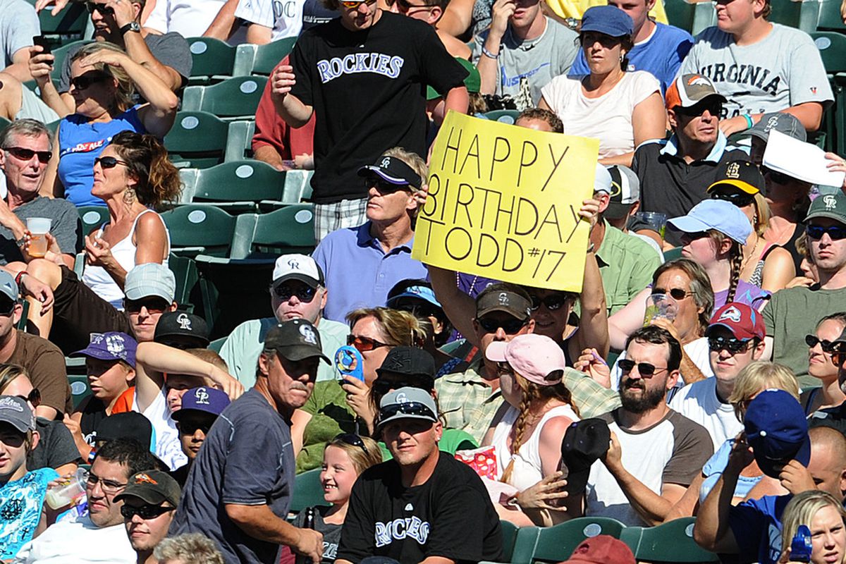 DENVER, CO - AUGUST 20:  A fan holds up a sign for Todd Helton #17 of the Colorado Rockies during the game against the Los Angeles Dodgers at Coors Field on August 20, 2011 in Denver, Colorado.  (Photo by Garrett W. Ellwood/Getty Images)