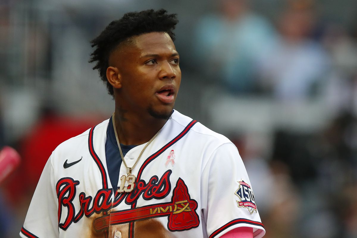 Ronald Acuna Jr. #13 of the Atlanta Braves looks on after scoring in the first inning of an MLB game against the Philadelphia Phillies at Truist Park on May 9, 2021 in Atlanta, Georgia.