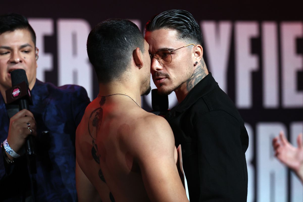 Teofimo Lopez and George Kambosos Jr. face off during a press conference for Triller Fight Club at Mercedes-Benz Stadium on April 16, 2021 in Atlanta, Georgia ahead of their June 5 lightweight title fight.
