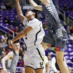 Hayden Welling of Corner Canyon defends Tevita Makaui of Highland during the 5A boys high school state basketball tournament in Ogden on Monday, Feb. 26, 2018.