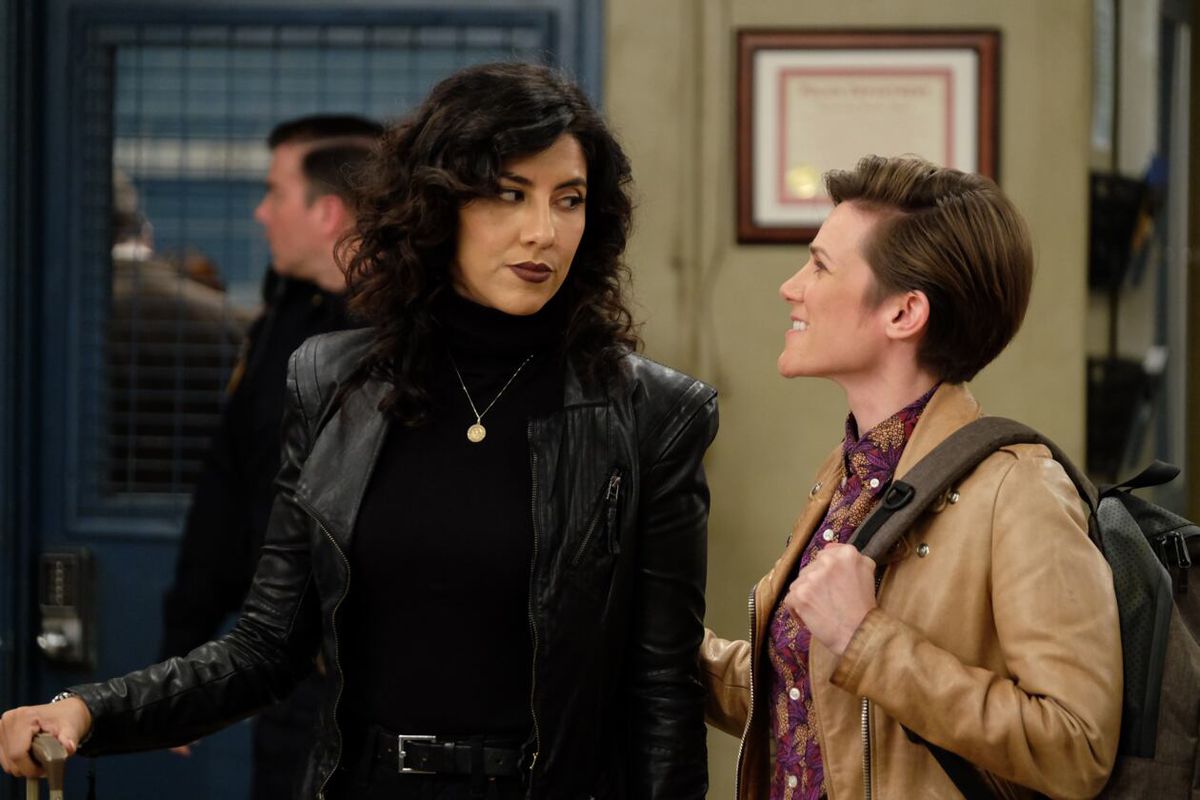 Rosa (Stephanie Beatriz) and Jocelyn (Cameron Esposito) share a look in a screenshot from Brooklyn Nine-Nine.