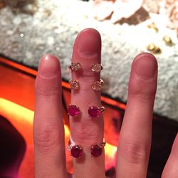 Gradient stackable knuckle rings with diamond, garnet, ruby, and pink tourmaline stones