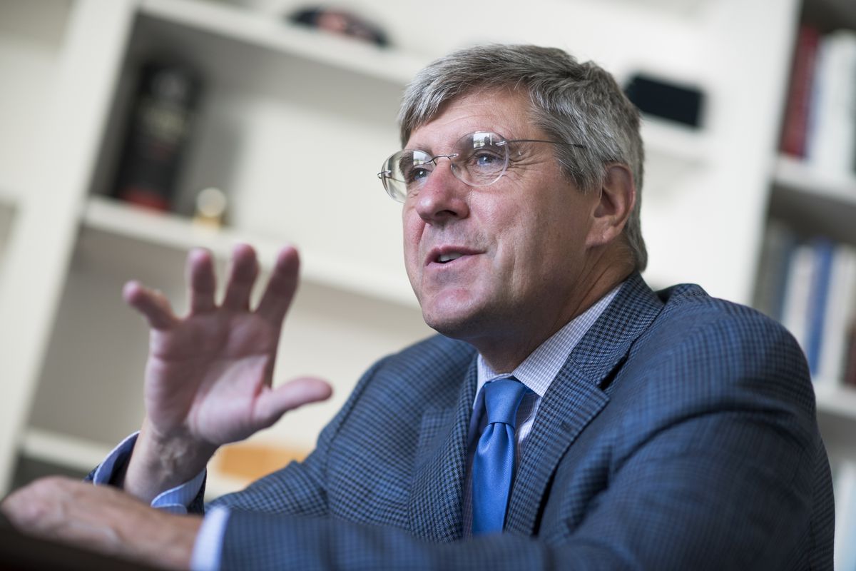 Stephen Moore waves his hand as he discusses policy with CQ.