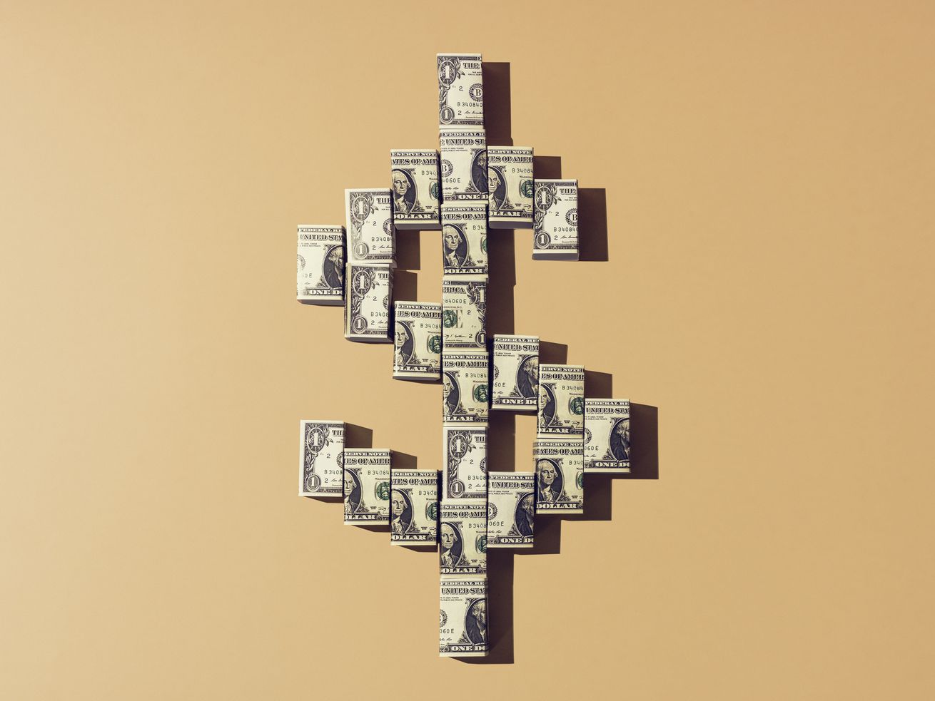 A dollar sign made out of dollar bills.