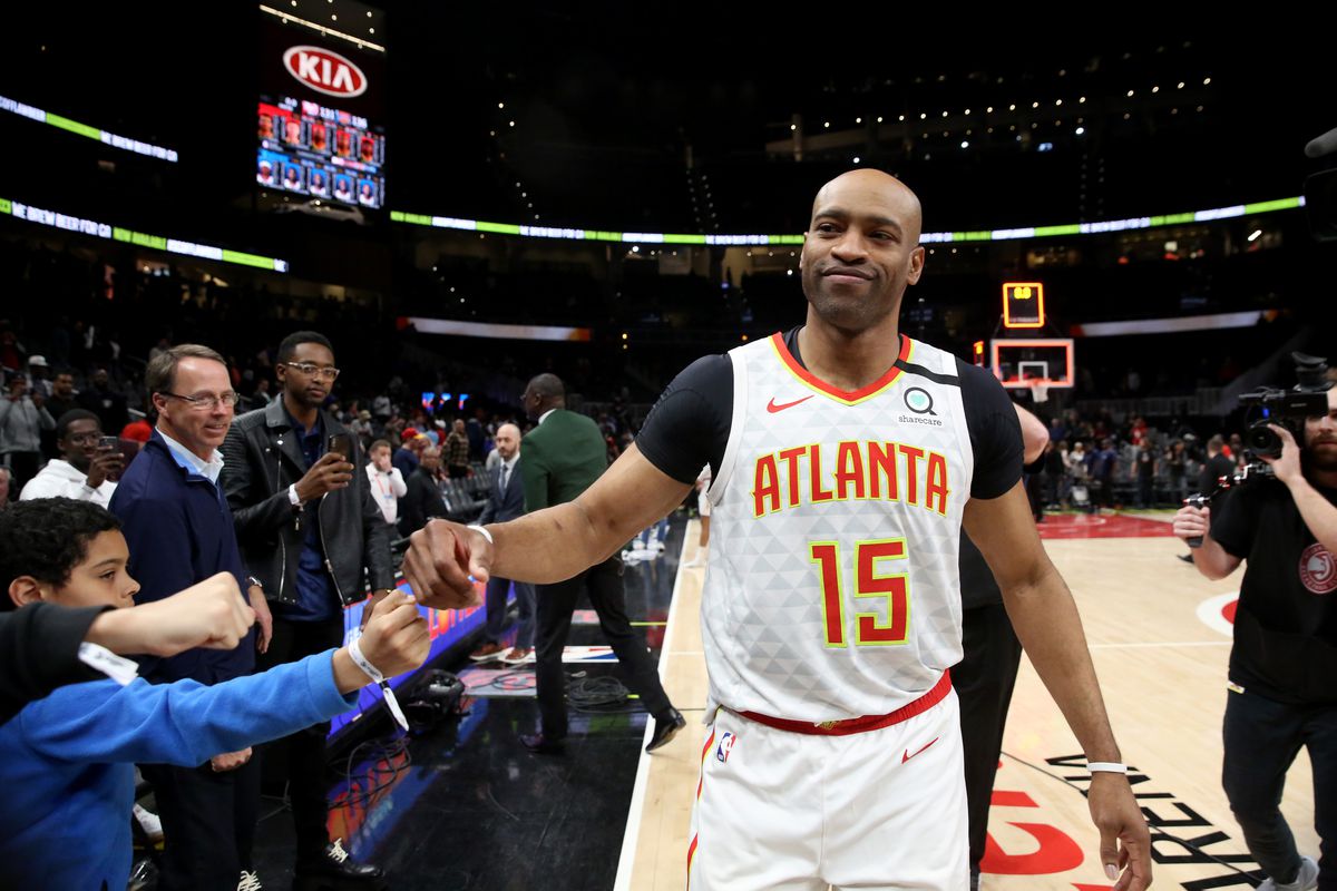 Atlanta Hawks guard Vince Carter fist bumps fans after an overtime loss to the New York Knicks at State Farm Arena.&nbsp;