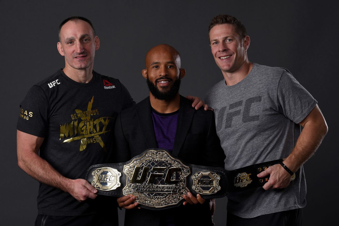 Demetrious Johnson poses for a photo after his highlight reel armbar win over Ray Borg in 2017.