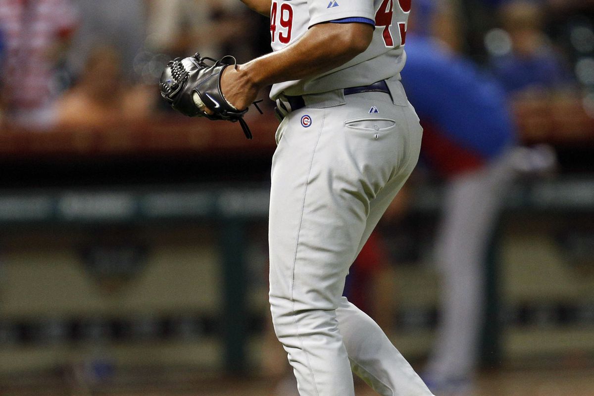 Houston, TX, USA; Chicago Cubs relief pitcher Carlos Marmol celebrates striking out the side to end the game against the Houston Astros at Minute Maid Park. Credit: Thomas Campbell-US PRESSWIRE