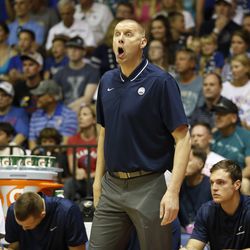 BYU head coach Mark Pope reacts to play as his team takes on Kansas during the first half of an NCAA college basketball game Tuesday, Nov. 26, 2019, in Lahaina, Hawaii. 