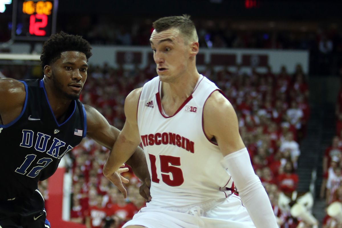 Sam Dekker drives on Duke's Justise Winslow in the ACC-Big Ten matchup between Duke and Wisconsin. 