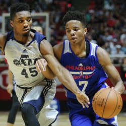 Utah Jazz guard Donovan Mitchell (45) defends Philadelphia 76ers guard Markelle Fultz (7) as the Utah Jazz and the Philadelphia 76ers play in Summer League action in the Huntsman Center at the University of Utah in Salt Lake City on Wednesday, July 5, 2017.