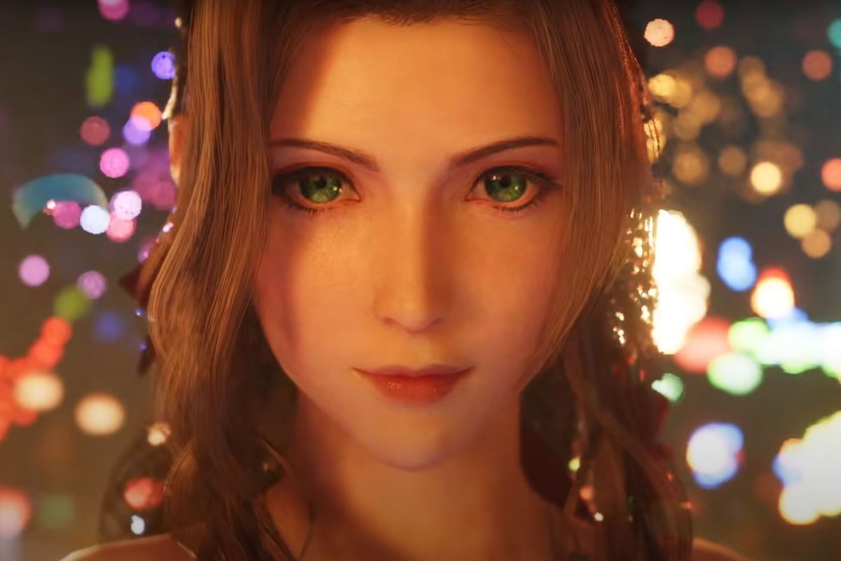 Aerith, backlit by the streets of Wall Market, flashes a gentle smile in Final Fantasy 7 Remake