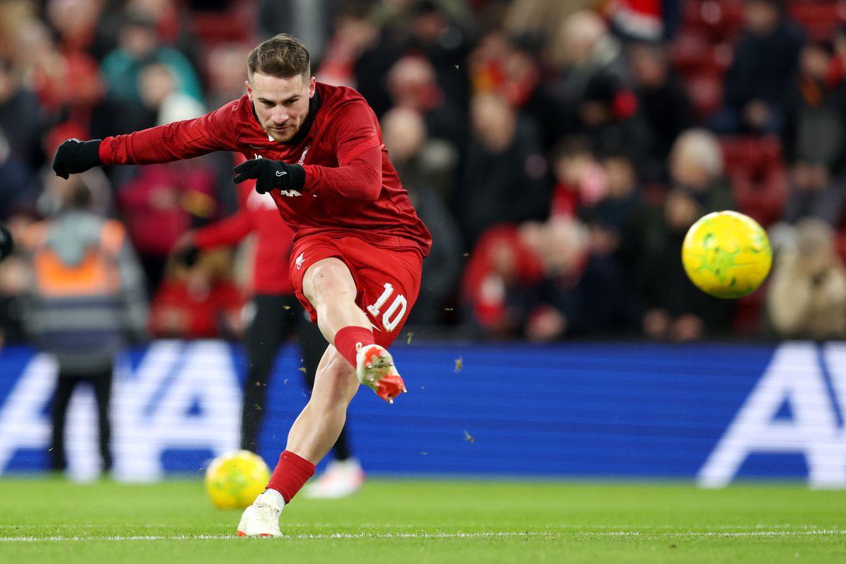 Alexis Mac Allister of Liverpool warms up prior to the Carabao Cup Semi Final First Leg match between Liverpool and Fulham at Anfield on January 10, 2024 in Liverpool, England.