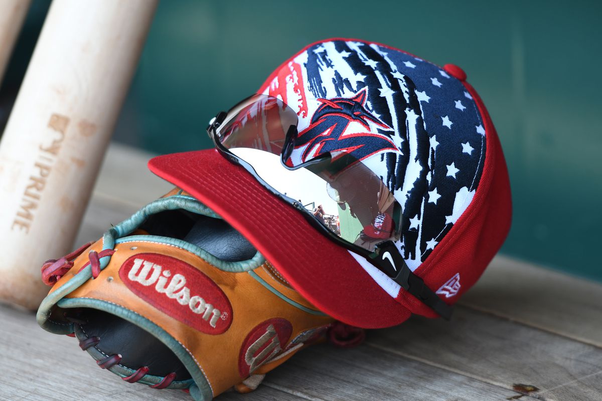 A Miami Marlins 4th July cap in the dugout during a baseball game against Washington Nationals at Nationals Park on July 4, 2022 in Washington, DC.