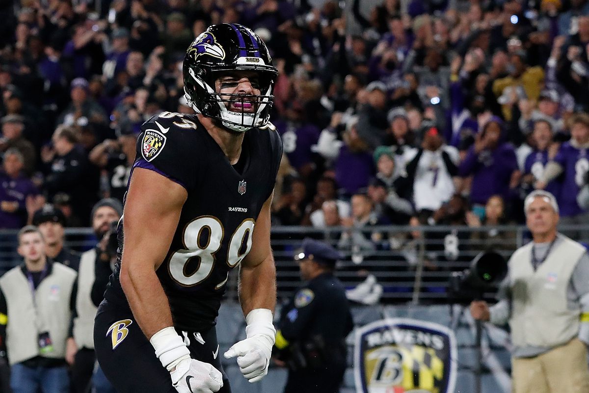 Mark Andrews of the Baltimore Ravens reacts after scoring a touchdown against Jessie Bates III of the Cincinnati Bengals during the second quarter at M&amp;T Bank Stadium on October 09, 2022 in Baltimore, Maryland.