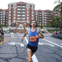 Jerrell Mock builds a huge lead as he sprints down 200 East on his way to victory in the Deseret News 10K race that finished at Liberty Park in Salt Lake City on Tuesday, July 24, 2018.