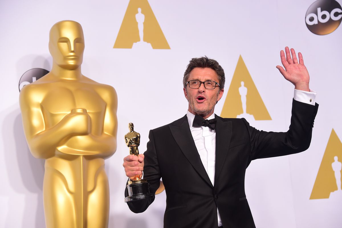 Pawel Pawlikowski poses with an Oscar