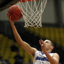 Bingham's Dason Youngblood (4) reaches for a layup in the first round of the 5A boys basketball tournament against Viewmont at the UCCU Events Center in Orem, Tuesday, March 1, 2016.