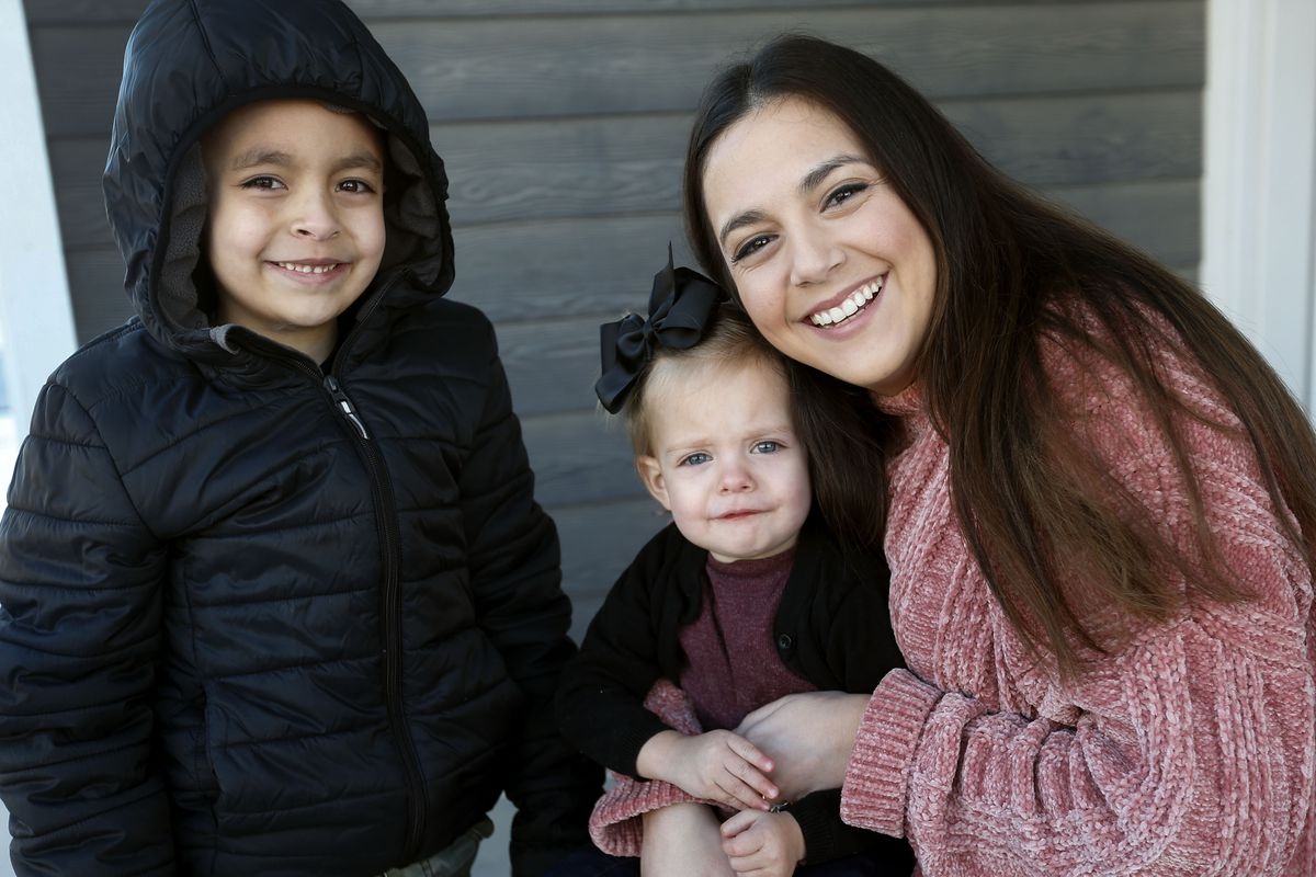 Evi Figgat, right, is photographed with daughter Elinor and son Oliver at their Eagle Mountain home on Wednesday, Feb. 17, 2021.