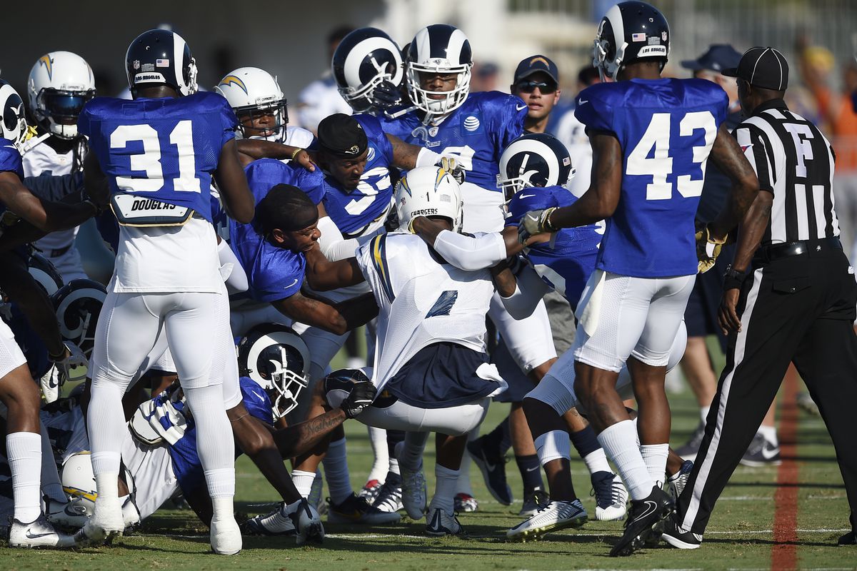The Los Angeles Rams and Los Angeles Chargers scuffle during a joint practice in training camp, Aug. 9, 2017.